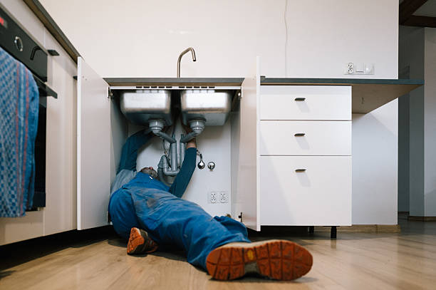 Professional Plumbing technician working in Mellott, IN